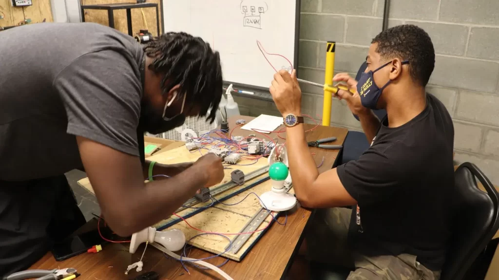  PTTI career program graduate from Philadelphia's underserved youth getting hired at a skilled trade job