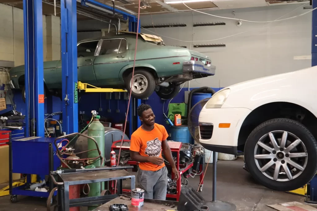 PTTI graduate during an automotive workshop