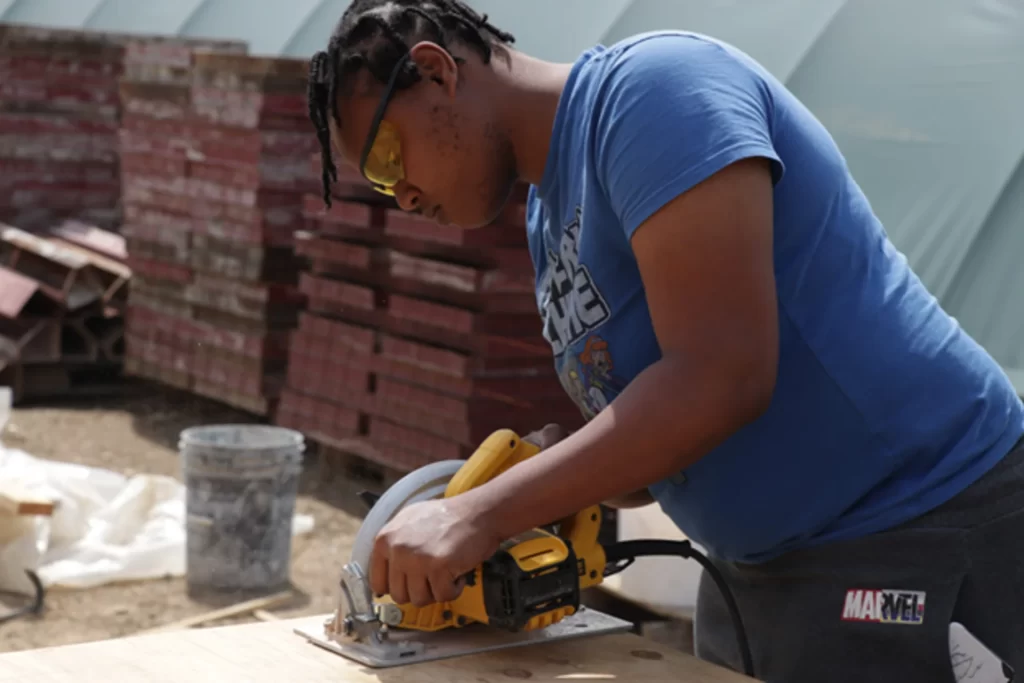 Concrete and masonry training lab at PTTI in Philadelphia with tools and student work areas
