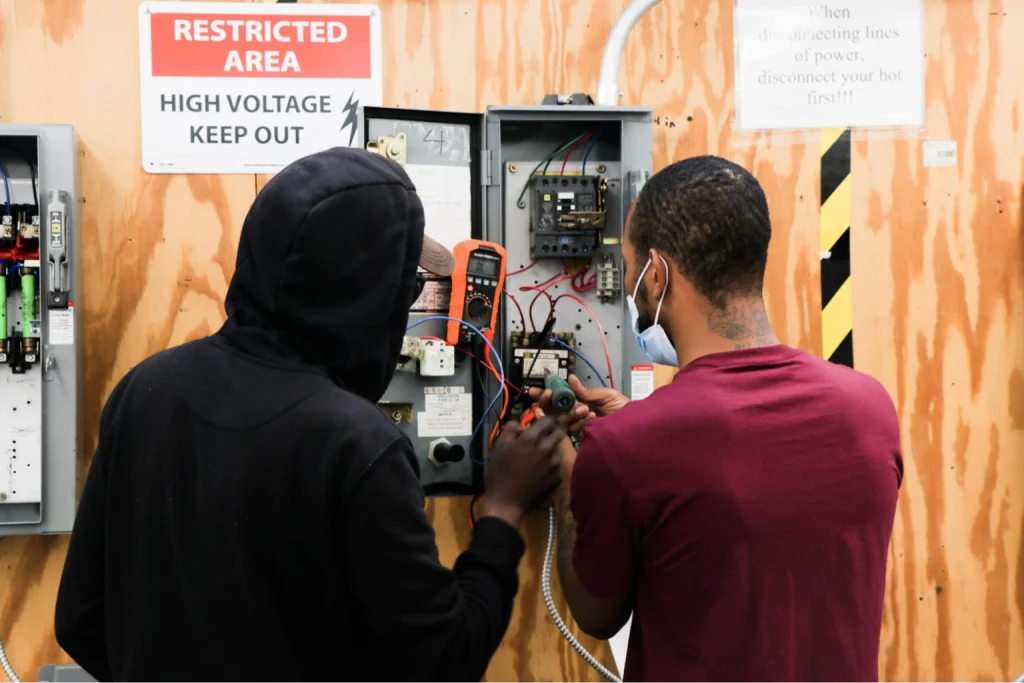 Technical instructor providing feedback during an engaging class session