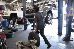 An Auto mechanic at auto repair shop