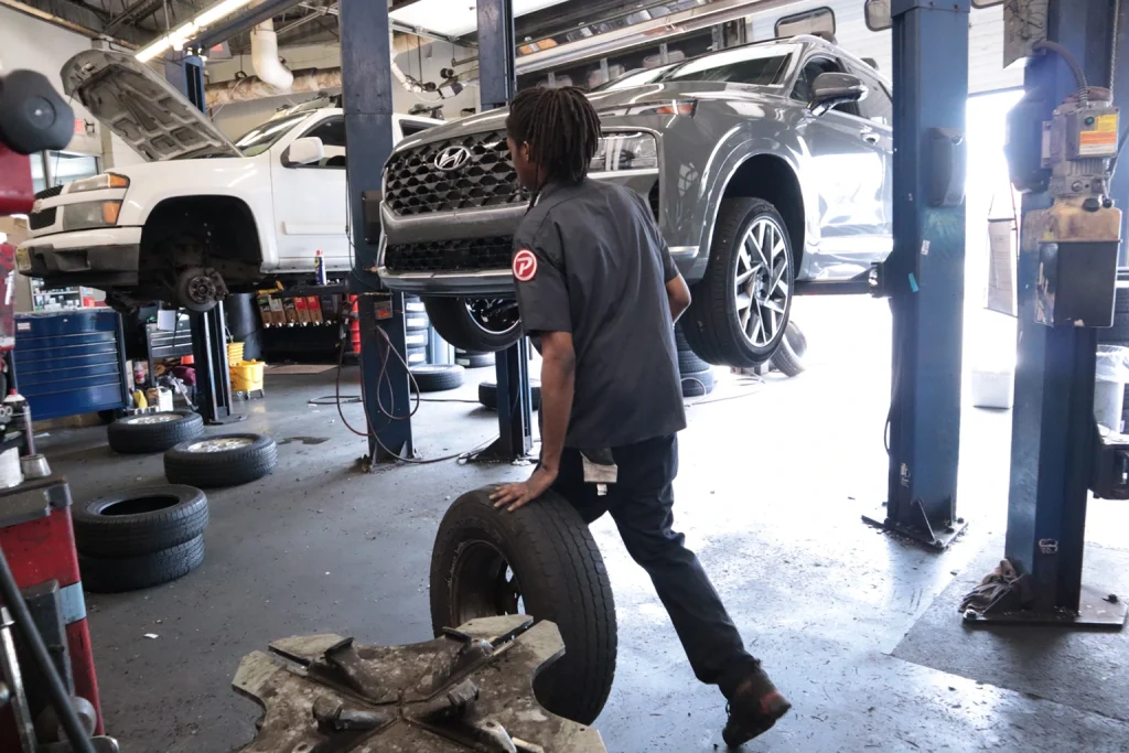 Student with Auto parts walking