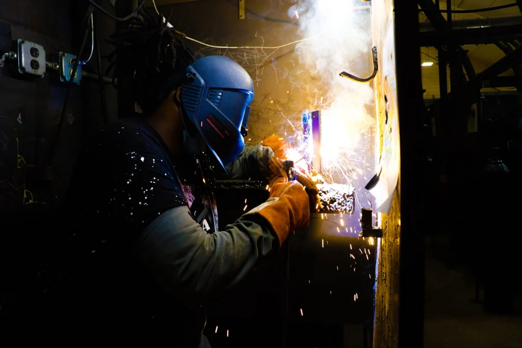 A welder in Philadelphia practicing with tools