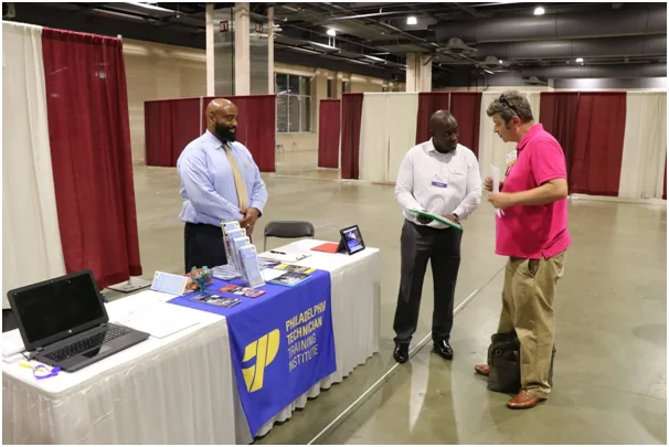 A tradesperson networking with suitable future clients.