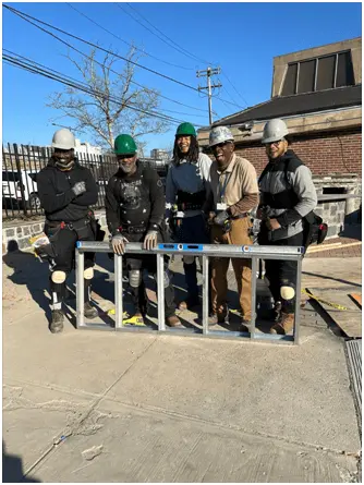Solar workers insert panels in an area