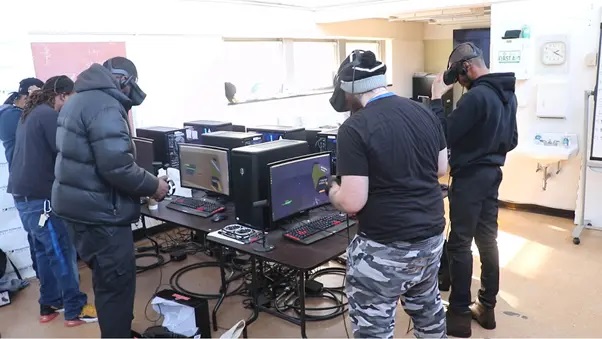 A modern trade school workplace with high-tech tools 