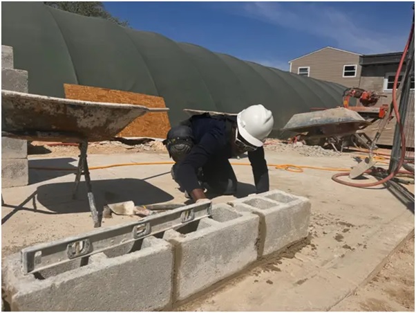 A student at a real construction site