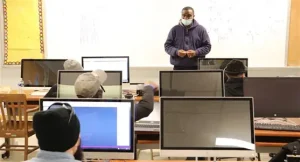  PTTI instructor teaching a student 