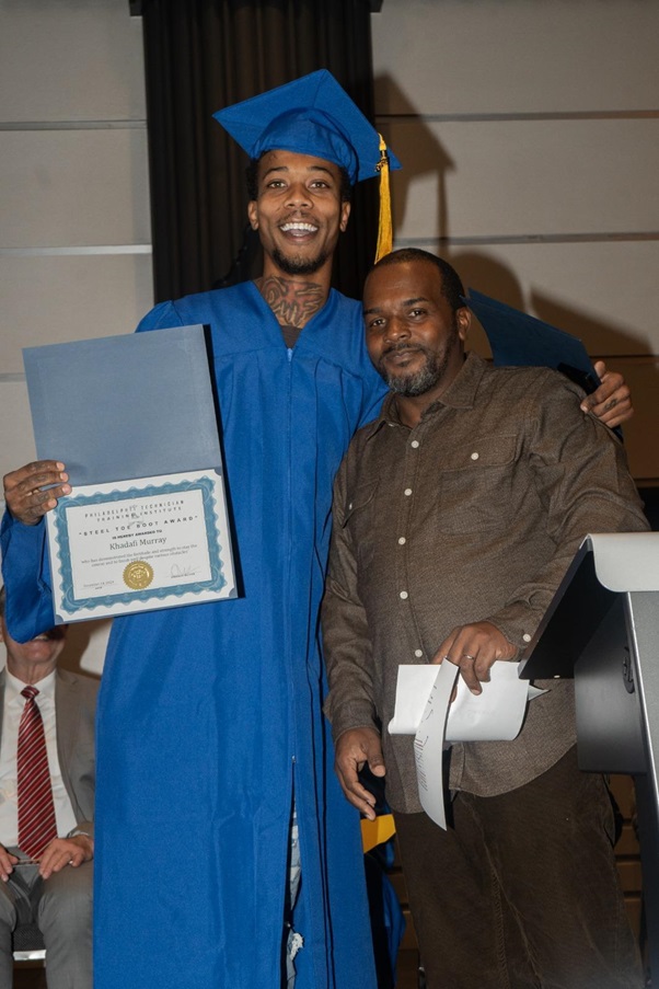 Graduate celebrating completion of vocational training program