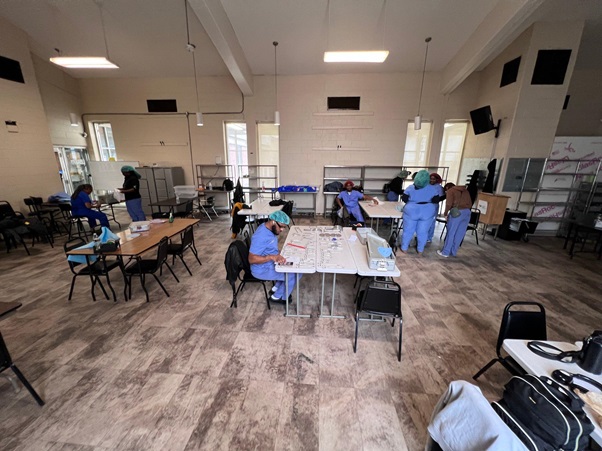 Healthcare students training in sterile processing lab classroom