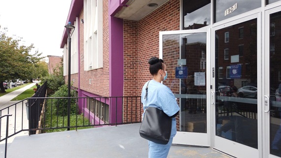 Healthcare vocational training student entering facility
