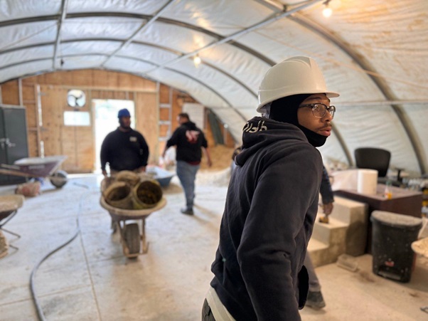 Students practicing hands-on skills in a skilled trades training program