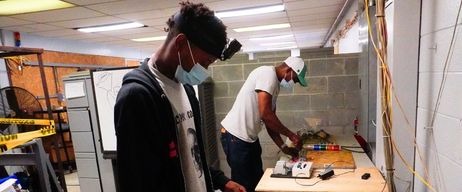 Students working in a shop environment