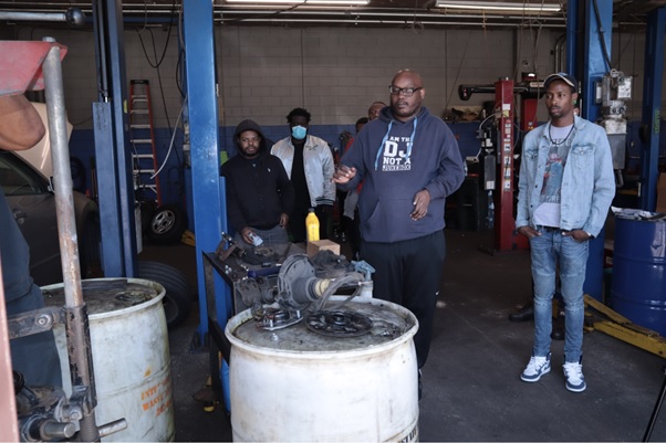 Students in a classroom studying industrial automation systems