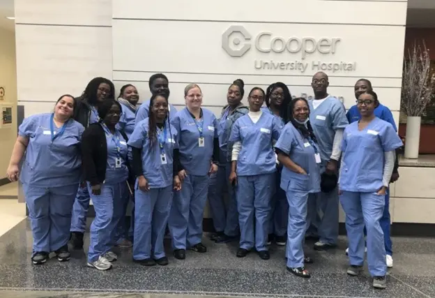 Group of women graduates from PTTI's healthcare trade school program in Philadelphia