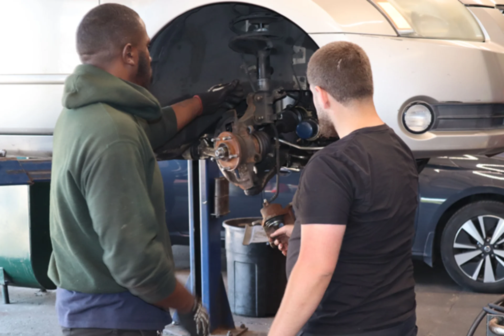 PTTI automotive training shop with vehicle bays and lifts in Philadelphia