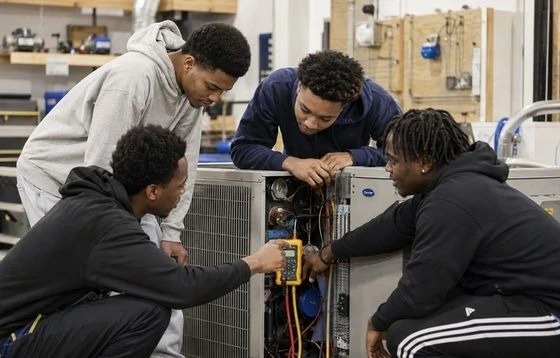 Students at Work lab analyzing HVAC Unit