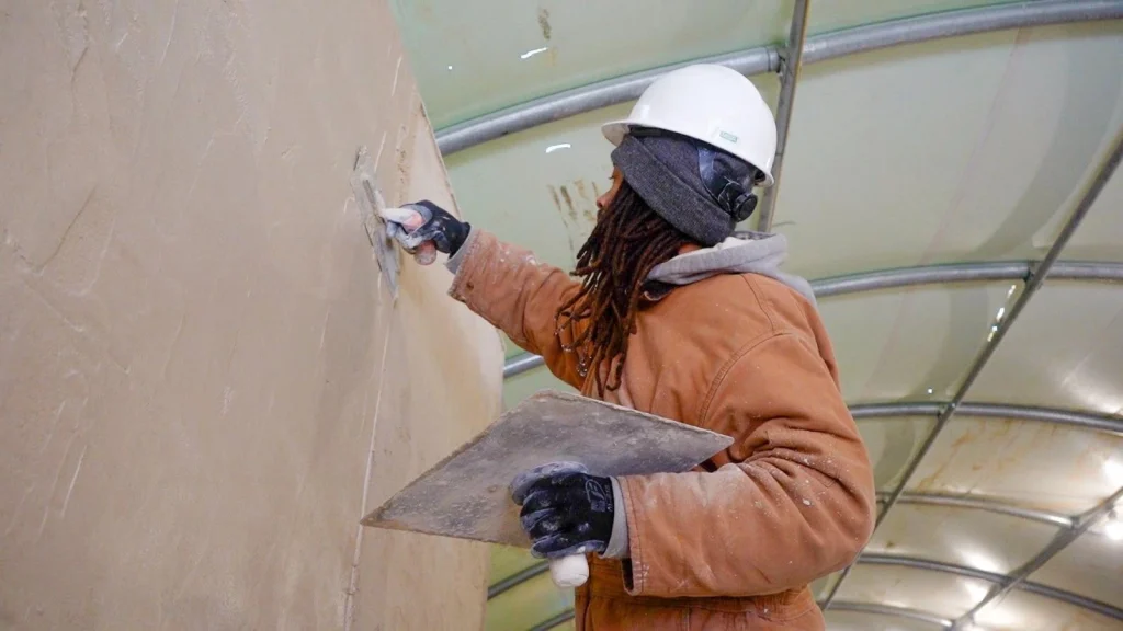 Student at construction job site
