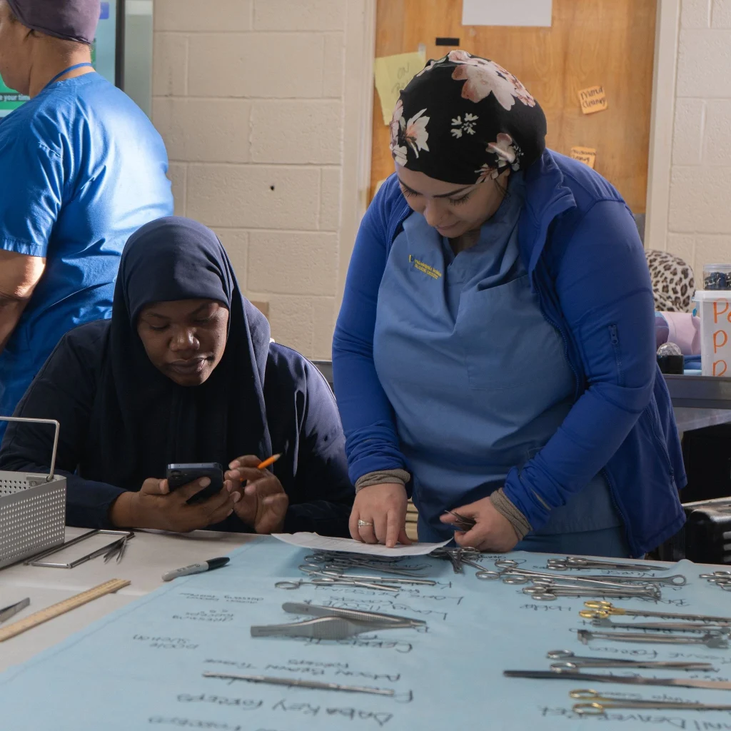 Student with medical tools and equipment.