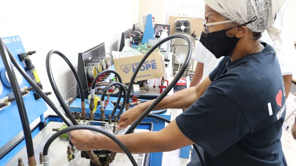 Student practicing in a Automation lab