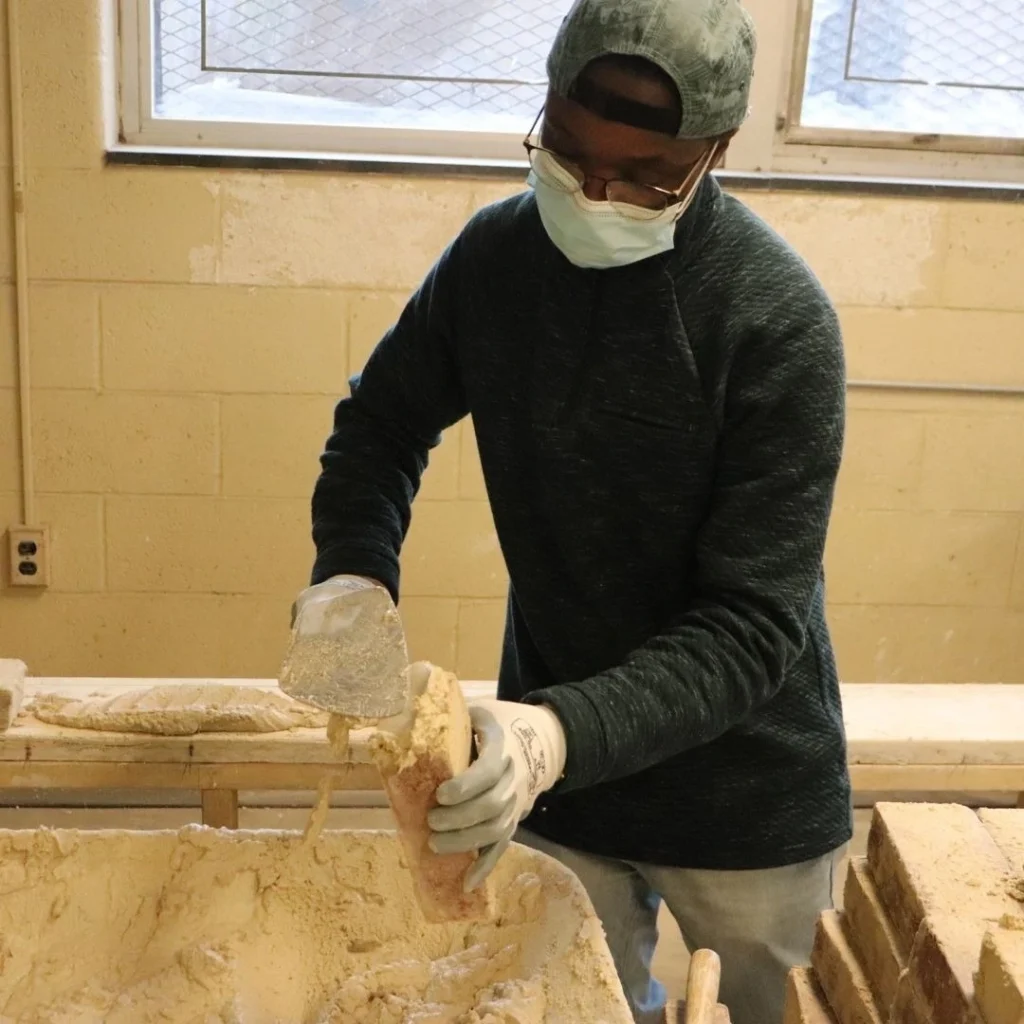 Masonry worker at construction site