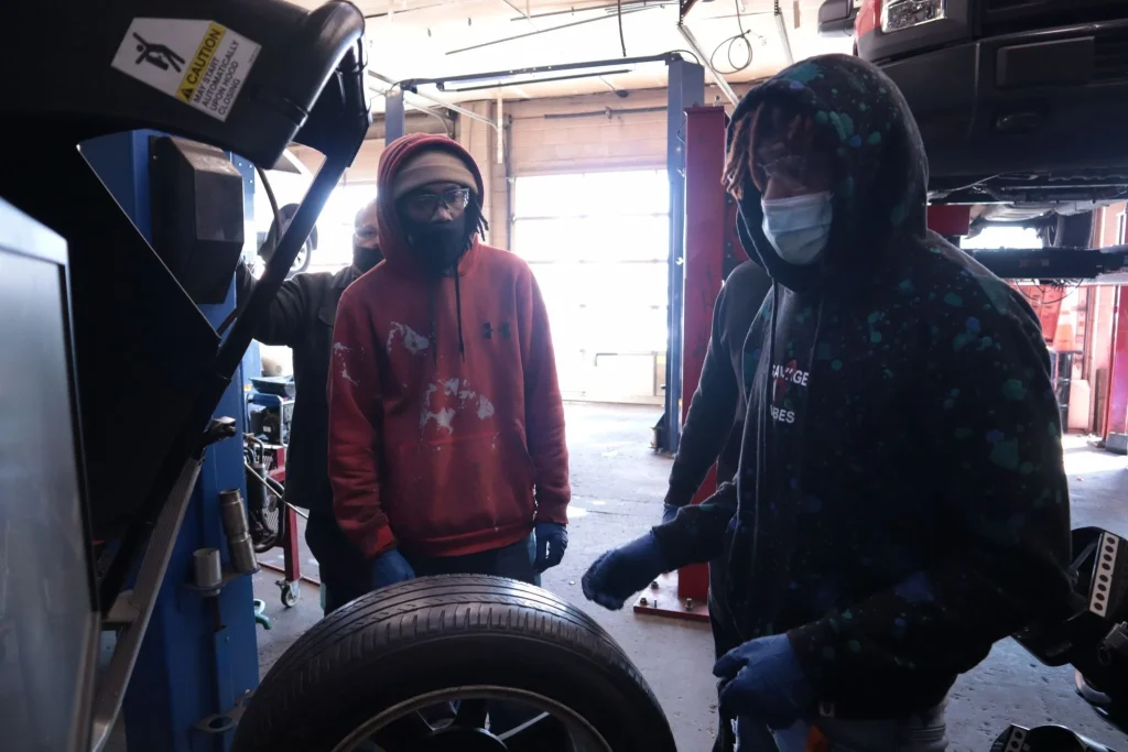 Students at Auto repair workshop