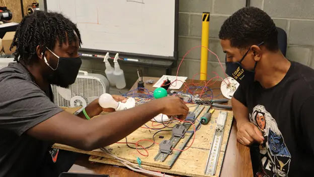 Students gaining hands-on automation and manufacturing training