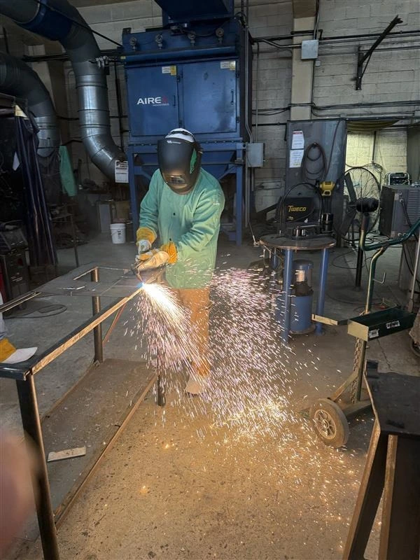 Welding certification training at PTTI work lab
