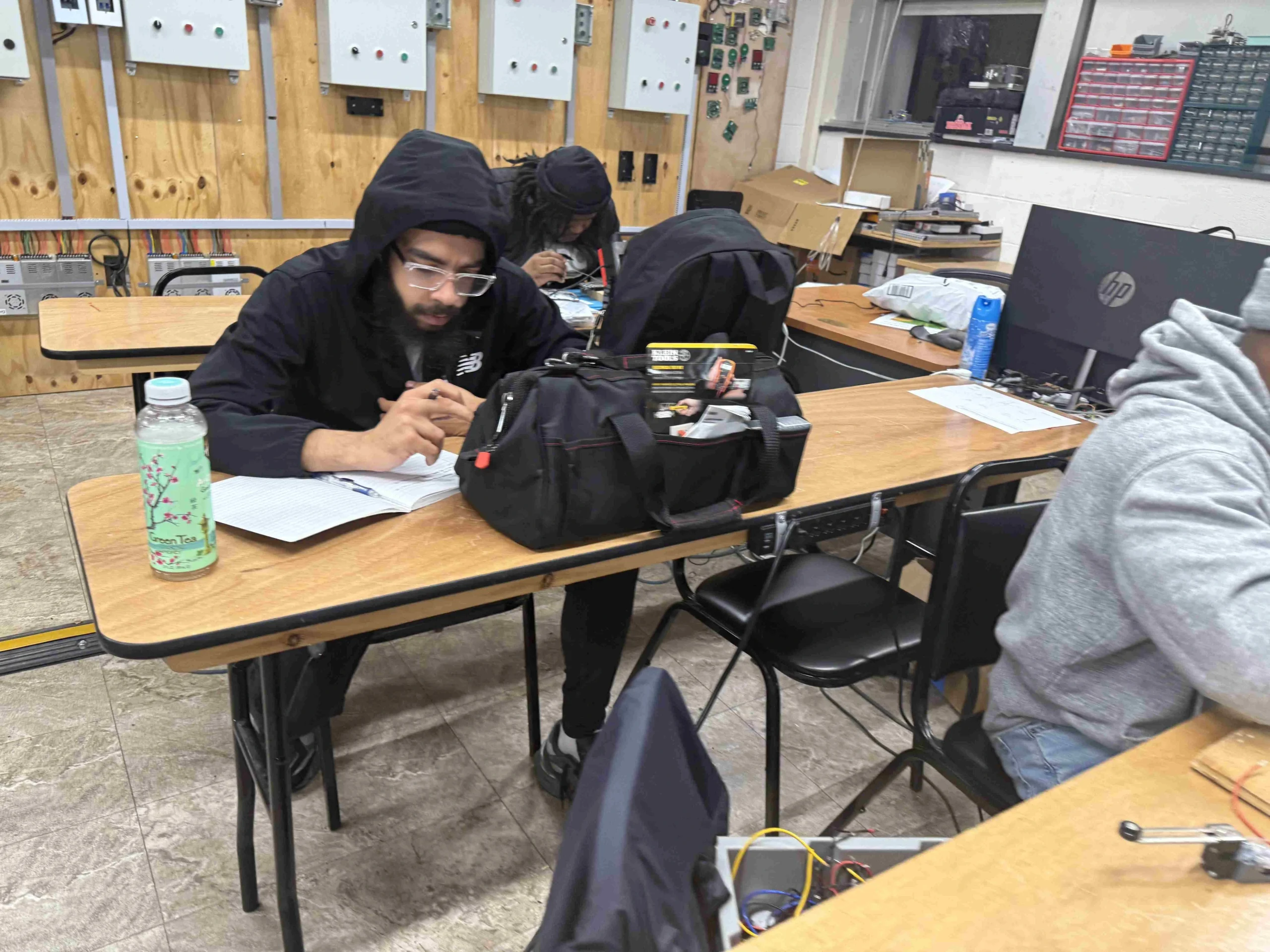 Adult student in an evening trade school lab