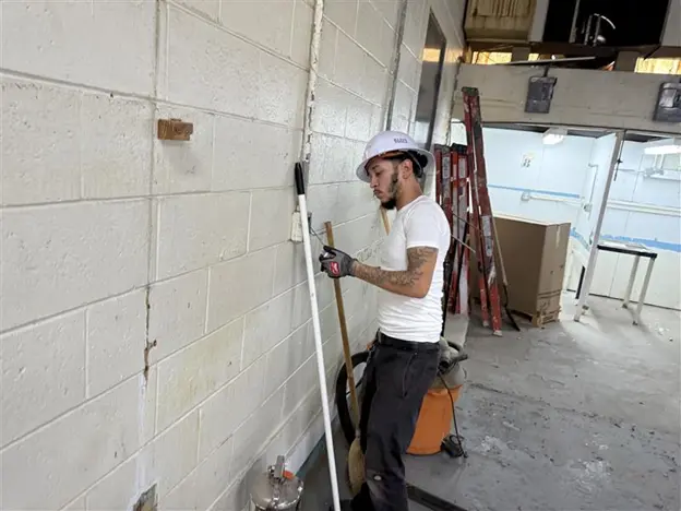 High school graduate training for a skilled trade at PTTI