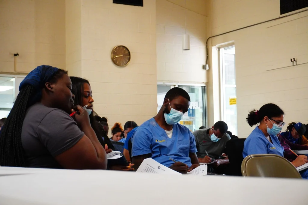 PTTI students practicing hands-on sterile processing training